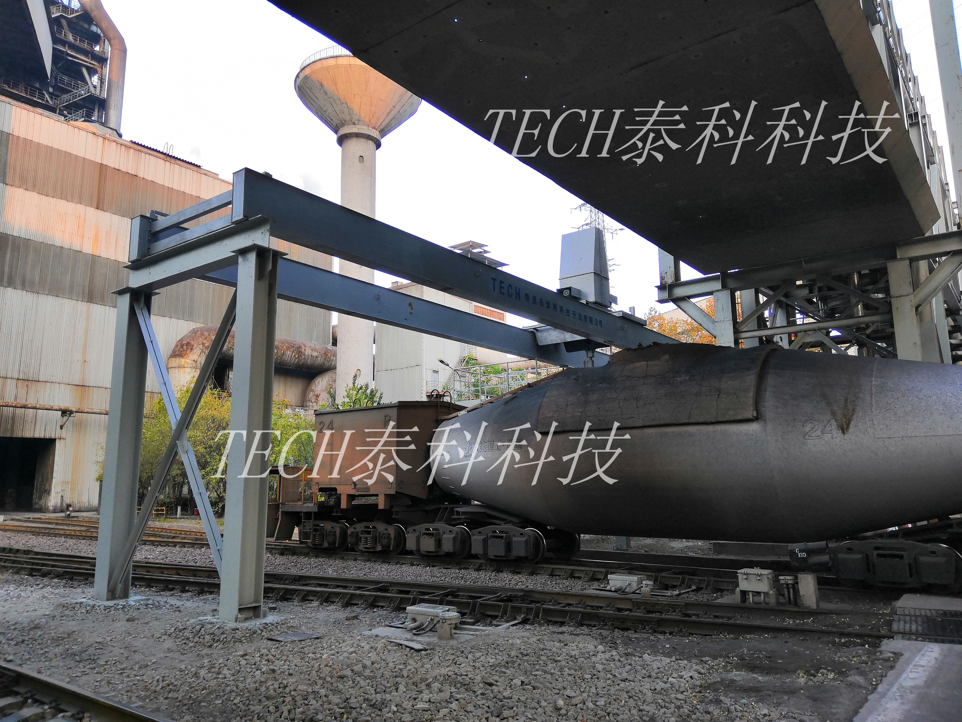 定點機(jī)械手式魚雷車加蓋裝置